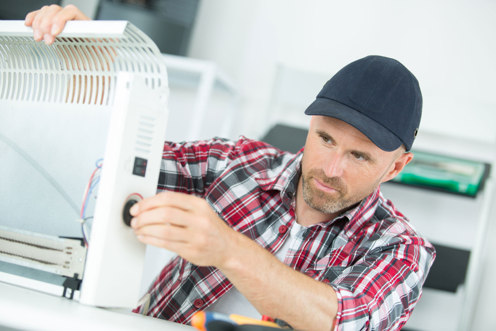 Contractor fixing AC Unit 